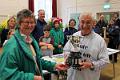 9. President Merrill Bayley presents the WI Cup for Cookery to John Coley
